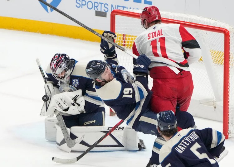 Carolina reaches 100-point mark and stays atop East with 5-2 victory over Blue Jackets Carolina reaches 100-point mark and stays atop East with 5-2 victory over Blue Jackets