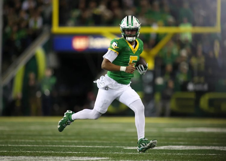 Dante Moore throws for two touchdowns and No. 7 Oregon routs Minnesota 42-13 Dante Moore throws for two touchdowns and No. 7 Oregon routs Minnesota 42-13