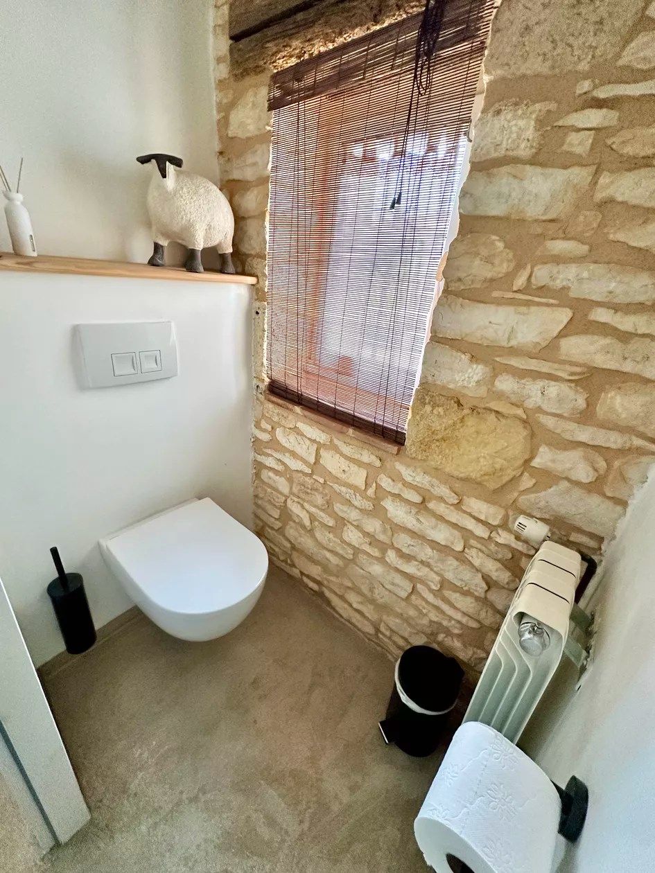 Chambre en pierre gîte Monpazier