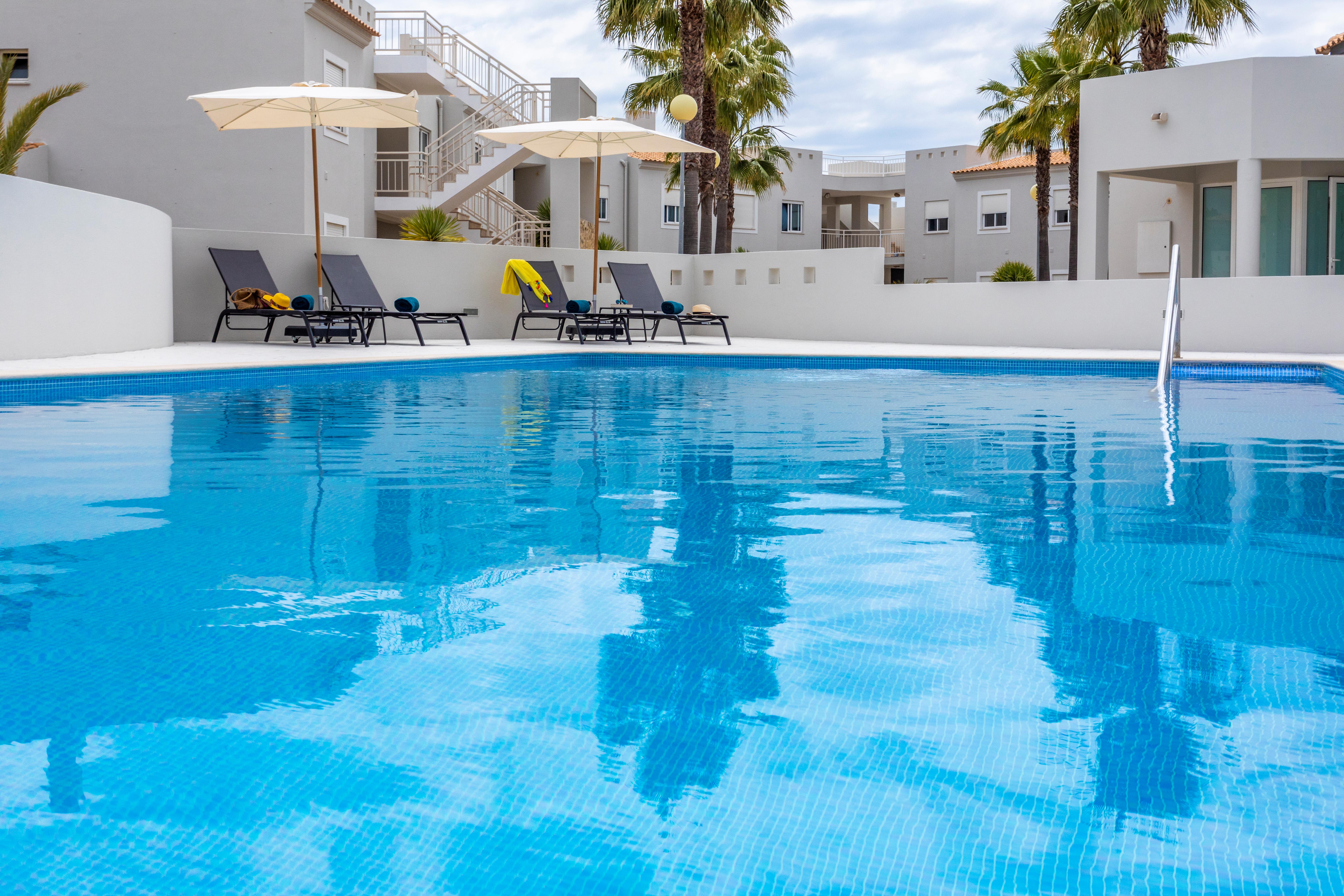 Appartementen Placid Village - inclusief huurauto