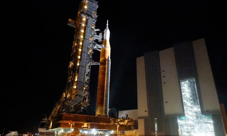 NASA hauls its repaired moon rocket from the hangar back to the pad for an early April launch NASA hauls its repaired moon rocket from the hangar back to the pad for an early April launch