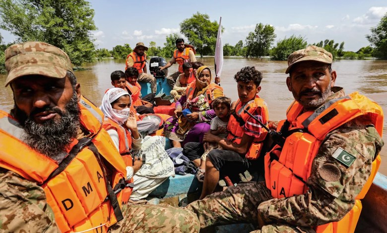 Five people dead as rescue boat overturns in Pakistan floods Five people dead as rescue boat overturns in Pakistan floods