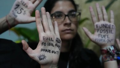 UN climate talks go into overtime as divisions over fossil fuels persist UN climate talks go into overtime as divisions over fossil fuels persist