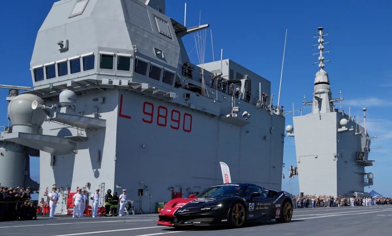 One man in an Italian supercar atop an aircraft carrier. And a record in his sights One man in an Italian supercar atop an aircraft carrier. And a record in his sights
