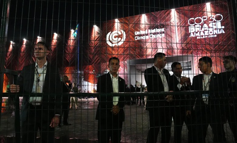 Protesters confront security at main venue of UN climate talks Protesters confront security at main venue of UN climate talks