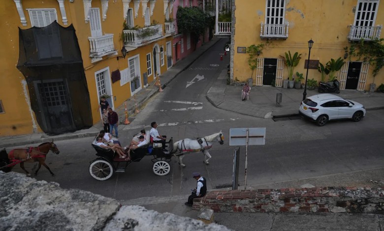 A Colombian city swaps iconic horse buggies for electric carriages amid animal welfare concerns A Colombian city swaps iconic horse buggies for electric carriages amid animal welfare concerns