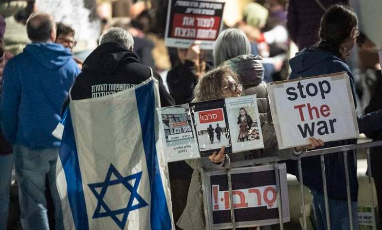 Anti-war protests held across Israel under wartime gathering limits Anti-war protests held across Israel under wartime gathering limits