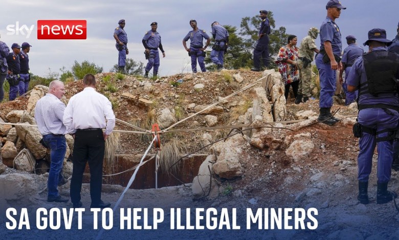 South African minister holds out olive branch to illegal miners in stand-off with police South African minister holds out olive branch to illegal miners in stand-off with police
