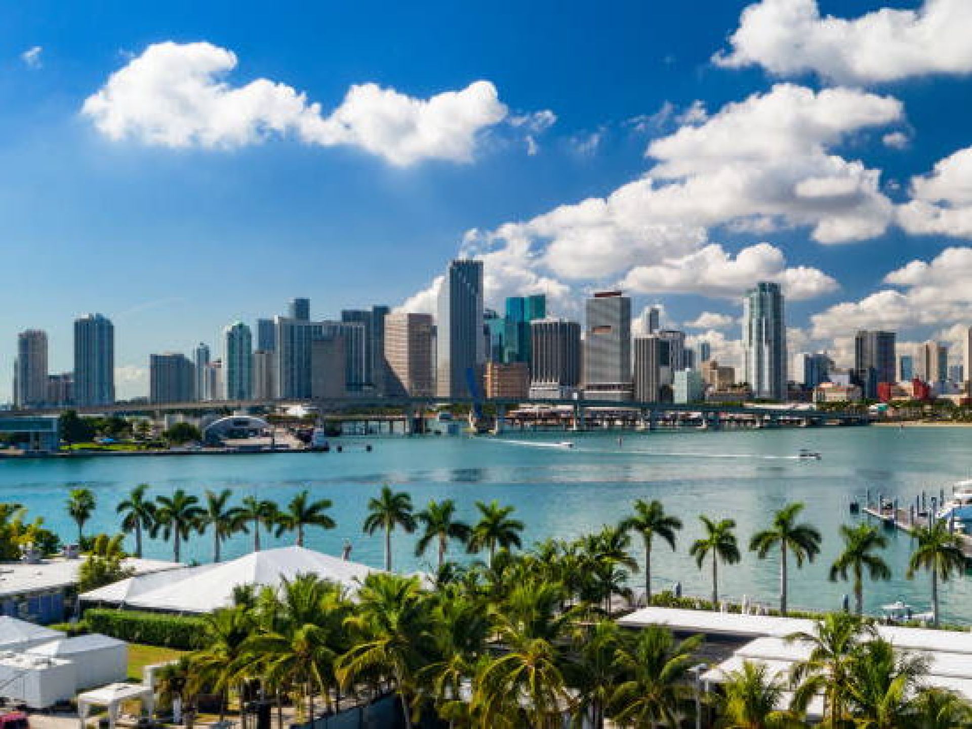 Stunning Miami skyline showcasing iconic buildings against a vibrant sunset, highlighting the city's beautiful urban landscape. Stunning Miami skyline showcasing iconic buildings against a vibrant sunset, highlighting the city's beautiful urban landscape.