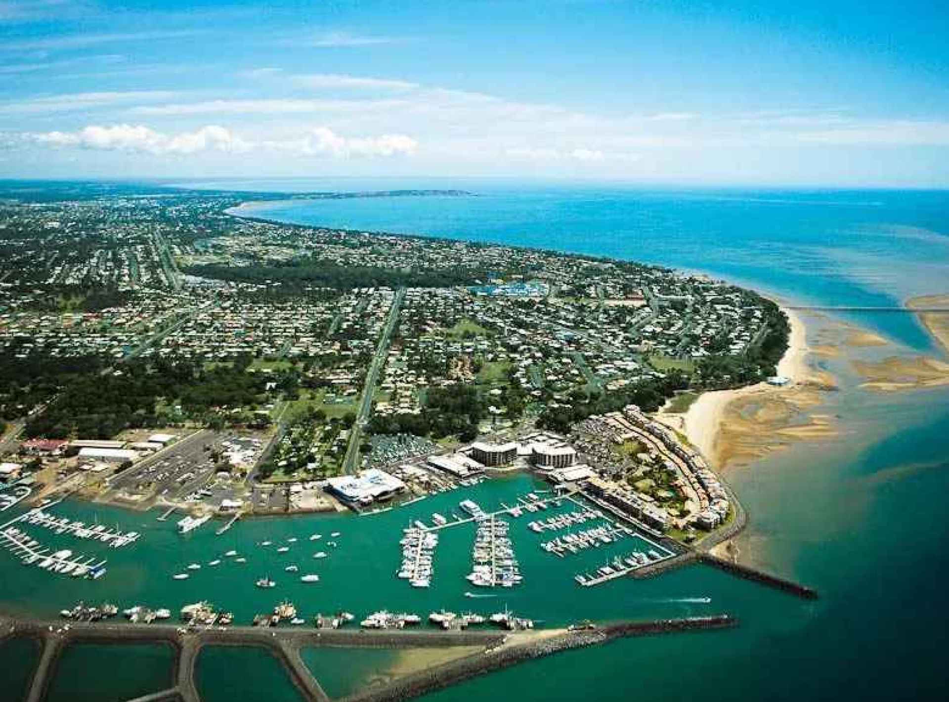 Whale watching tour in Hervey Bay with majestic whales breaching the water under a clear blue sky. Whale watching tour in Hervey Bay with majestic whales breaching the water under a clear blue sky.