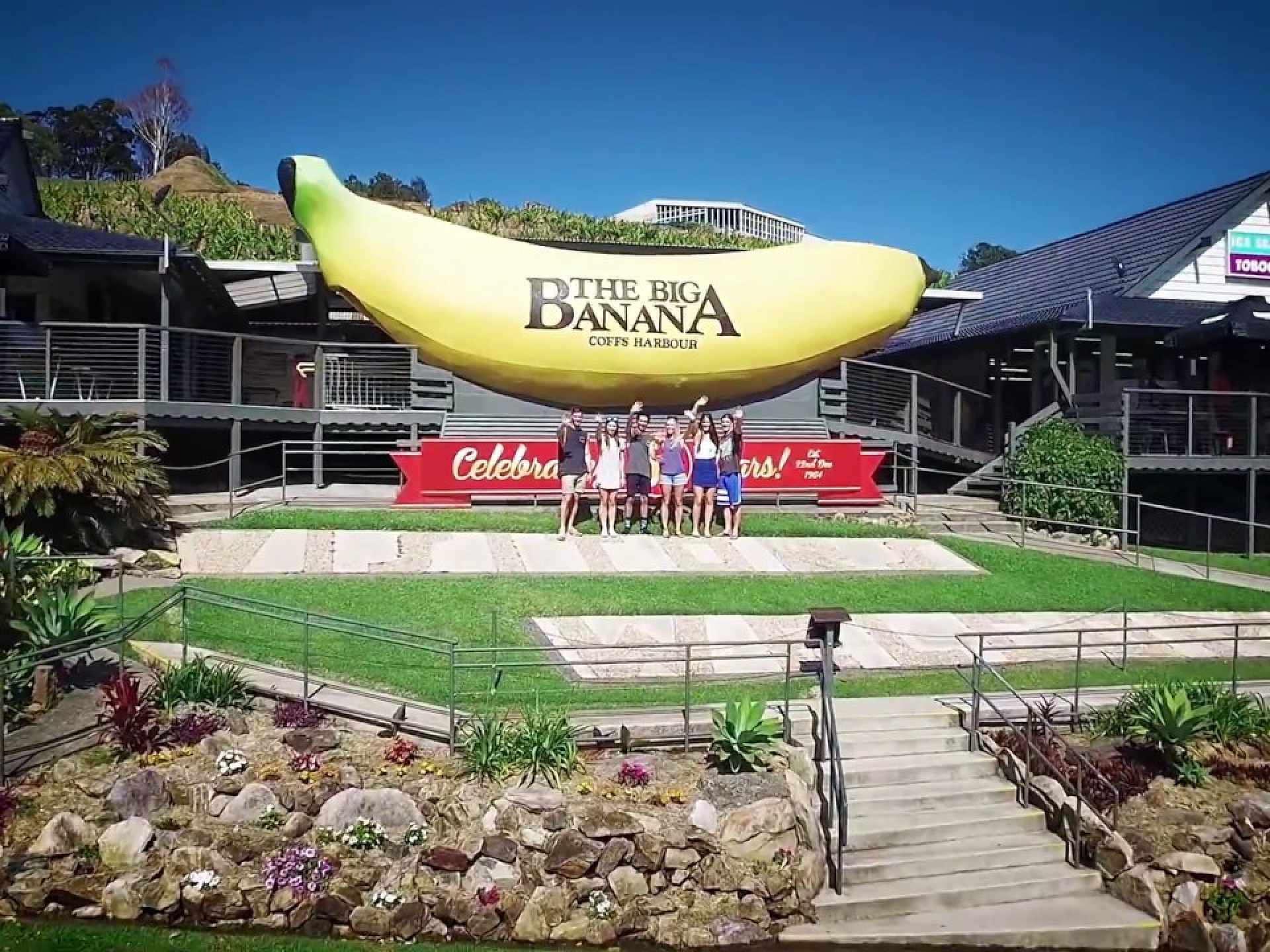 A vibrant view of the Big Banana in Coffs Harbour, showcasing its iconic structure surrounded by lush green scenery and clear blue skies. A vibrant view of the Big Banana in Coffs Harbour, showcasing its iconic structure surrounded by lush green scenery and clear blue skies.
