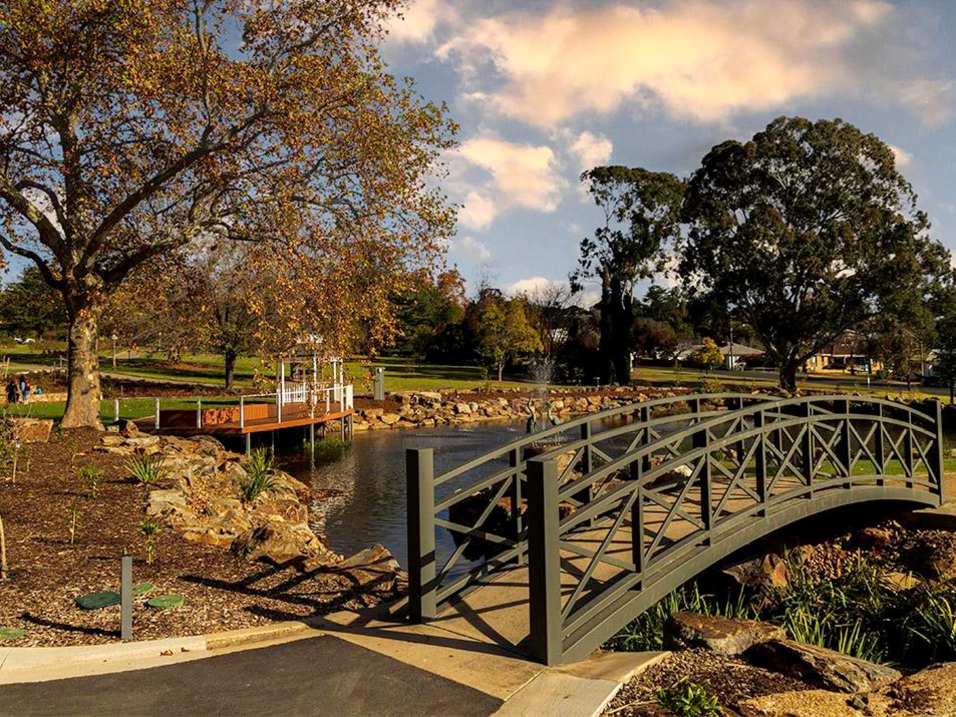 A scenic view of the lush greenery and vibrant flowers at Wagga Wagga Botanic Gardens in Australia. A scenic view of the lush greenery and vibrant flowers at Wagga Wagga Botanic Gardens in Australia.