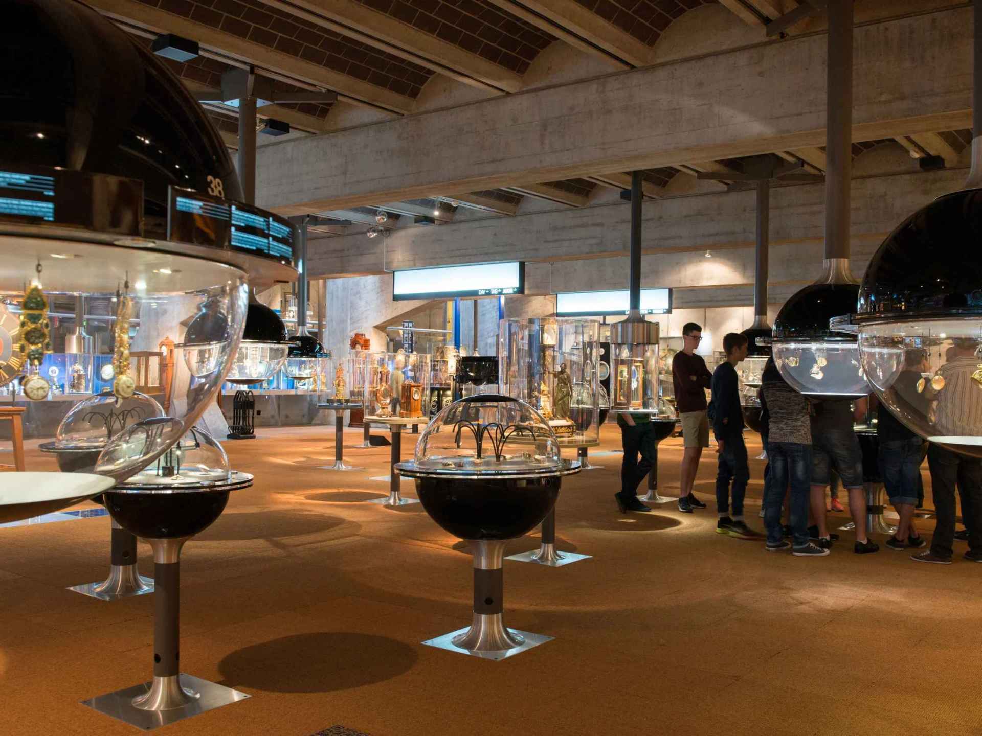 An exhibit showcasing intricate timepieces at the Watch Museum in La Chaux-de-Fonds, Switzerland. An exhibit showcasing intricate timepieces at the Watch Museum in La Chaux-de-Fonds, Switzerland.