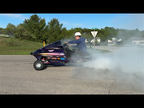 Putting Wheels on a Snowmobile Makes for a Rowdy Off-Road Trike Putting Wheels on a Snowmobile Makes for a Rowdy Off-Road Trike