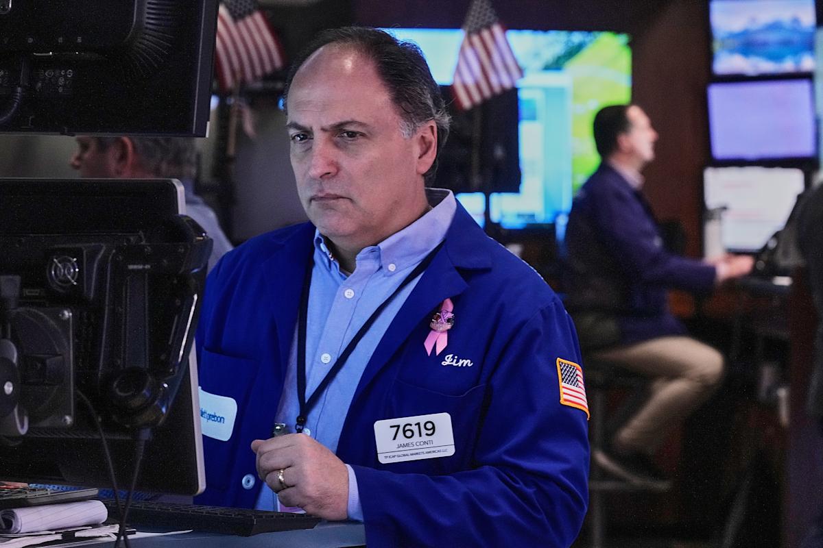 Stocks edge a bit below their latest records on Wall Street Stocks edge a bit below their latest records on Wall Street