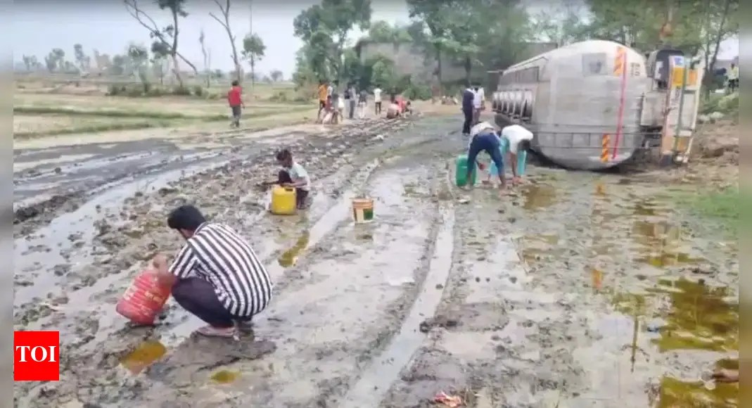 ‘Tragedy, apathy, greed’: Tanker overturns on Varanasi–Lucknow Highway; viral video shows villagers looting oil | Lucknow News ‘Tragedy, apathy, greed’: Tanker overturns on Varanasi–Lucknow Highway; viral video shows villagers looting oil | Lucknow News
