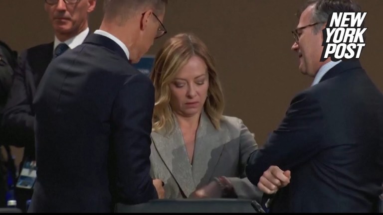 Italian PM Meloni rolls eyes, checks imaginary watch waiting for Biden’s arrival at NATO Summit Italian PM Meloni rolls eyes, checks imaginary watch waiting for Biden’s arrival at NATO Summit