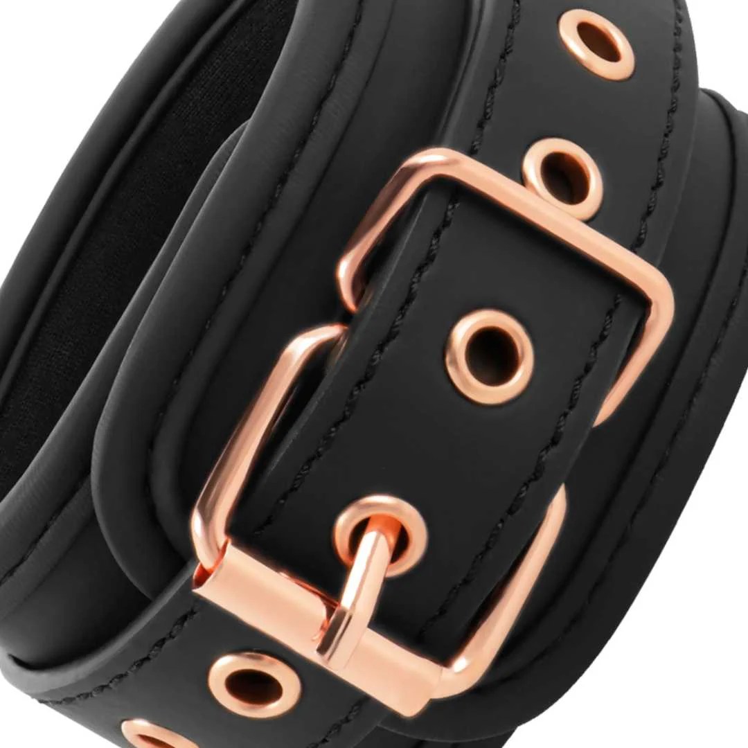 Handfesseln mit Gold-Details