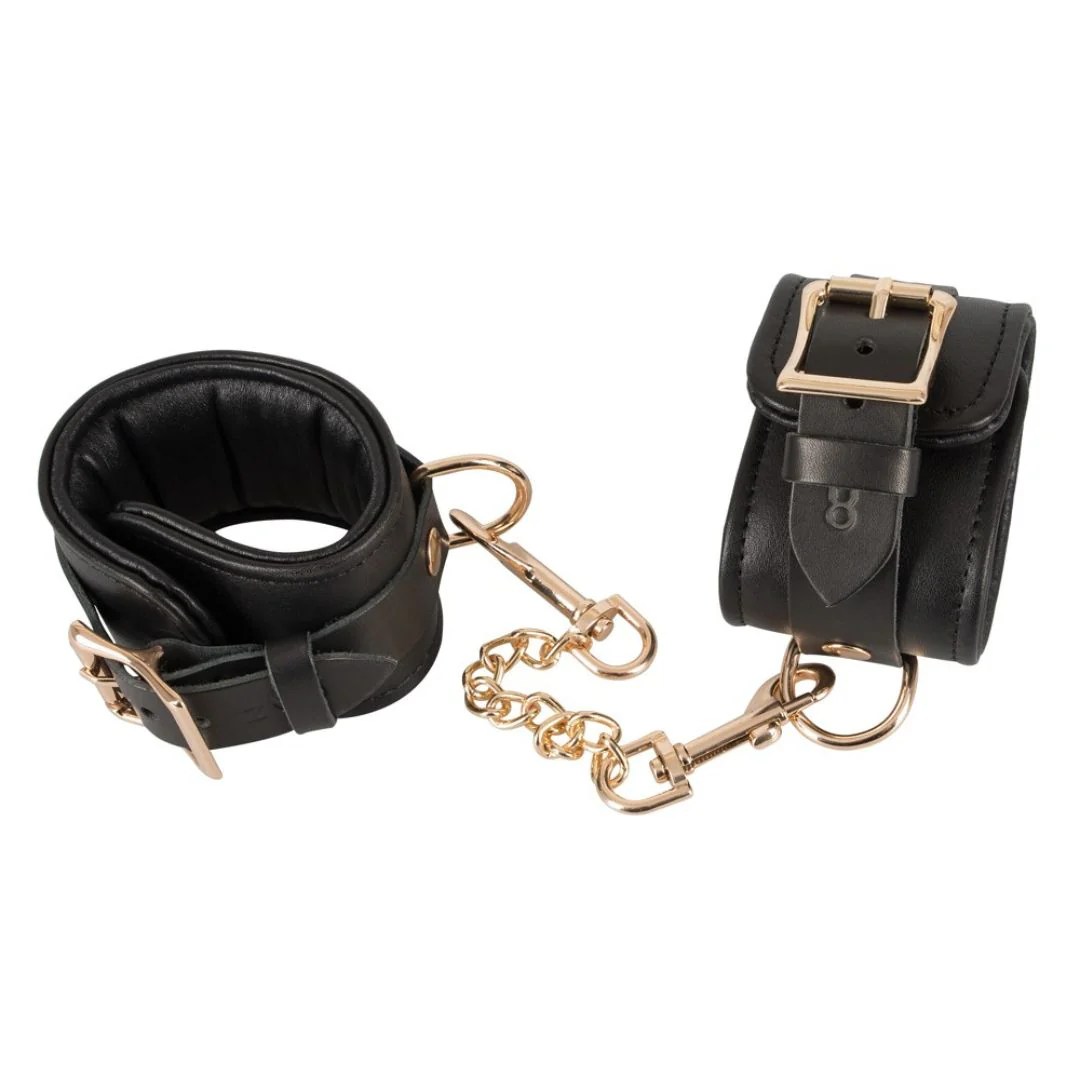 Handfessel aus Leder mit Gold-Details