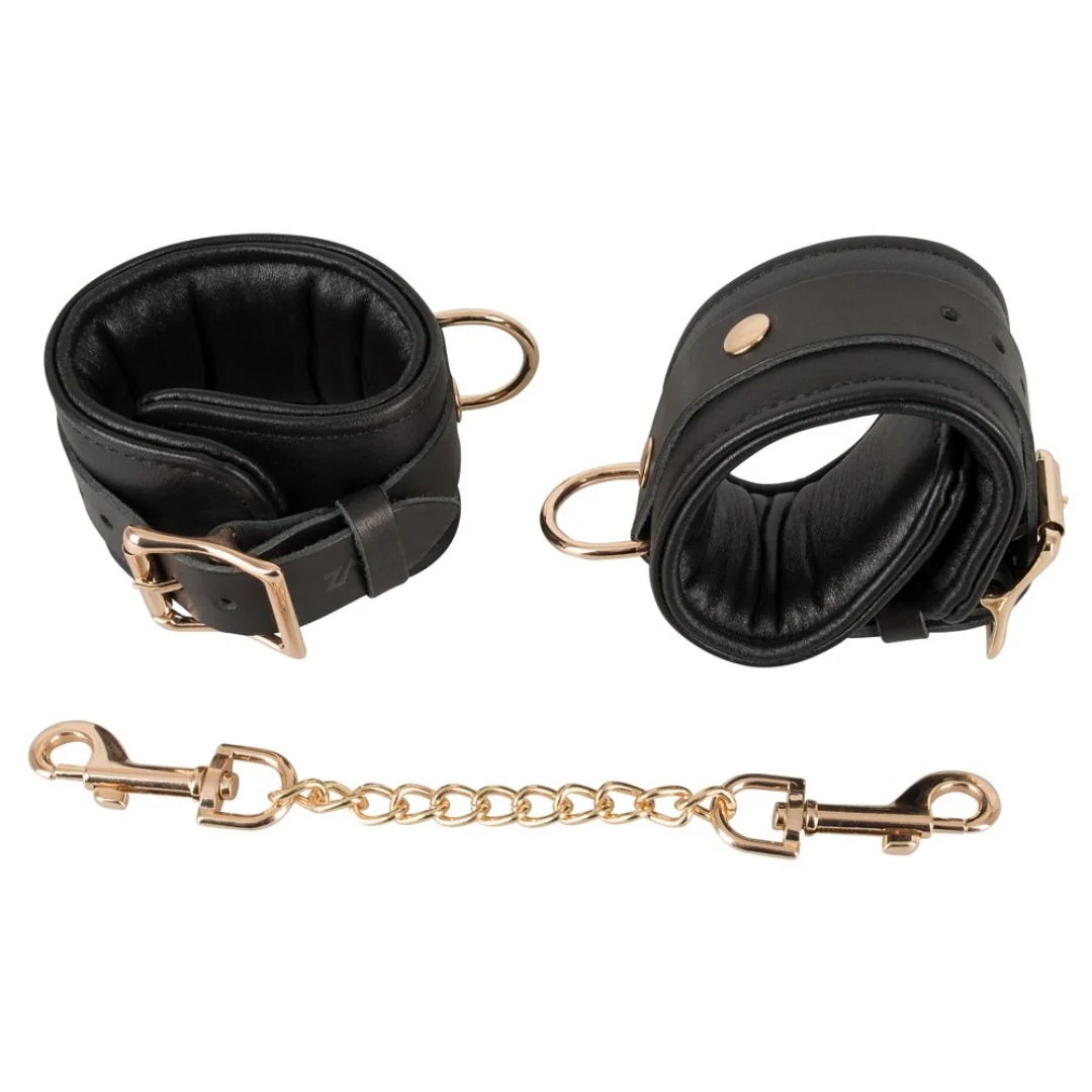 Handfessel aus Leder mit Gold-Details