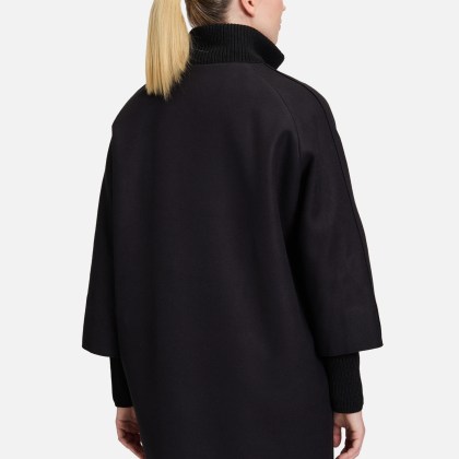 Wollmantel mit Strickdetails Wollmantel mit Strickdetails