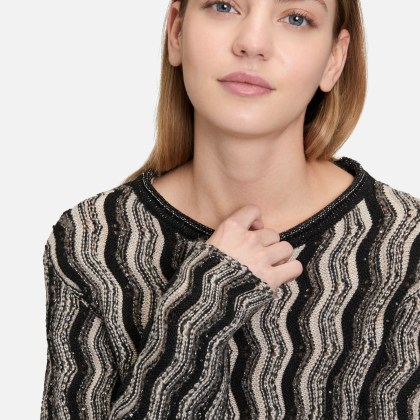 Strickpullover mit Pailletten Strickpullover mit Pailletten