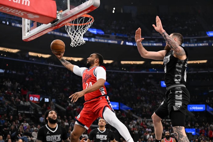 Ivica Zubac leads surging Clippers past Spurs 122-117 and into fourth place in the crowded West Ivica Zubac leads surging Clippers past Spurs 122-117 and into fourth place in the crowded West