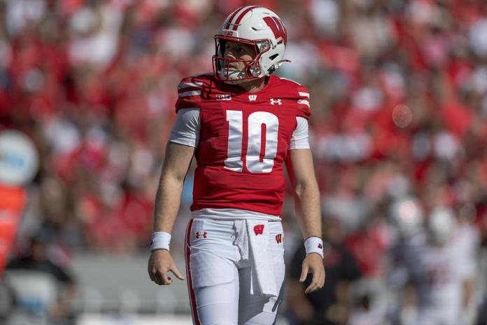 Wisconsin QB Tyler Van Dyke carted to locker room after suffering right knee injury vs. Alabama Wisconsin QB Tyler Van Dyke carted to locker room after suffering right knee injury vs. Alabama