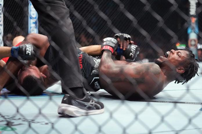 UFC 302: Michal Oleksiejczuk refuses to tap out on arm bar, even after Kevin Holland appears to injure his arm UFC 302: Michal Oleksiejczuk refuses to tap out on arm bar, even after Kevin Holland appears to injure his arm