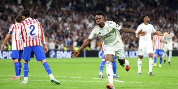 10-man Real Madrid stay in La Liga title hunt with thrilling Madrid derby victory 10-man Real Madrid stay in La Liga title hunt with thrilling Madrid derby victory