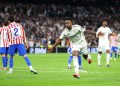 10-man Real Madrid stay in La Liga title hunt with thrilling Madrid derby victory 10-man Real Madrid stay in La Liga title hunt with thrilling Madrid derby victory
