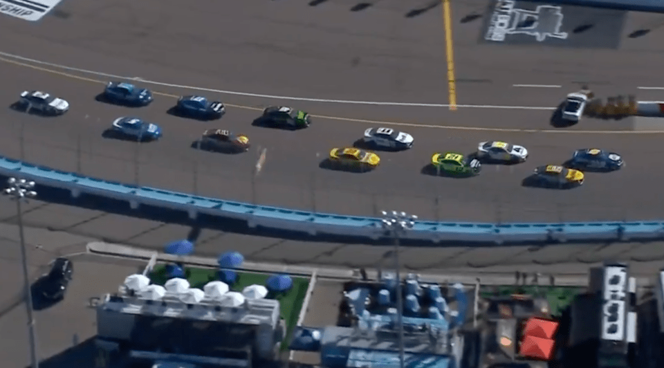 NASCAR championship race briefly stopped after tempo automobile crashes into sand barrels NASCAR championship race briefly stopped after tempo automobile crashes into sand barrels