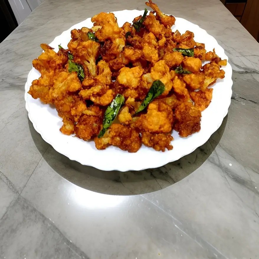 Golden Gobi Goodness: Spicy Cauliflower Pakoda Recipe in a Jiffy Golden Gobi Goodness: Spicy Cauliflower Pakoda Recipe in a Jiffy