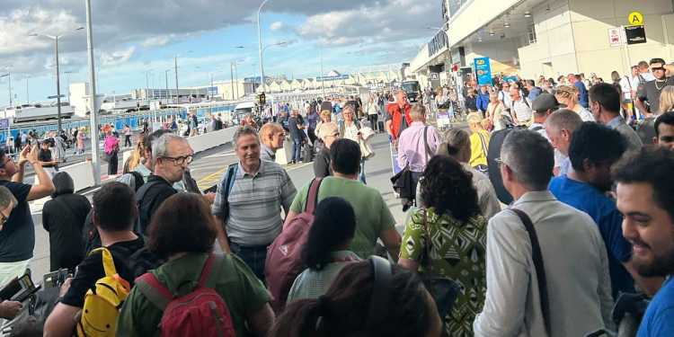 False alarm causes evacuation, travel disruption at Auckland Airport domestic terminal False alarm causes evacuation, travel disruption at Auckland Airport domestic terminal