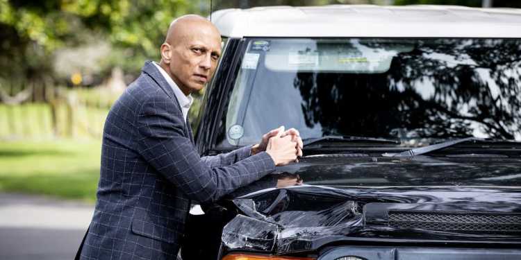 Auckland driver survives after light pole falls on car Auckland driver survives after light pole falls on car