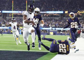 John Harbaugh's Ravens run over Jim Harbaugh's Chargers in latest brotherly battle John Harbaugh's Ravens run over Jim Harbaugh's Chargers in latest brotherly battle