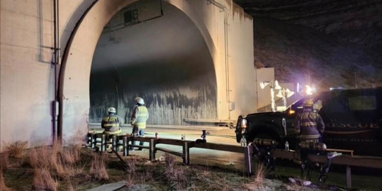 Investigators enter a highway tunnel in Wyoming where a fiery crash killed 2 Investigators enter a highway tunnel in Wyoming where a fiery crash killed 2