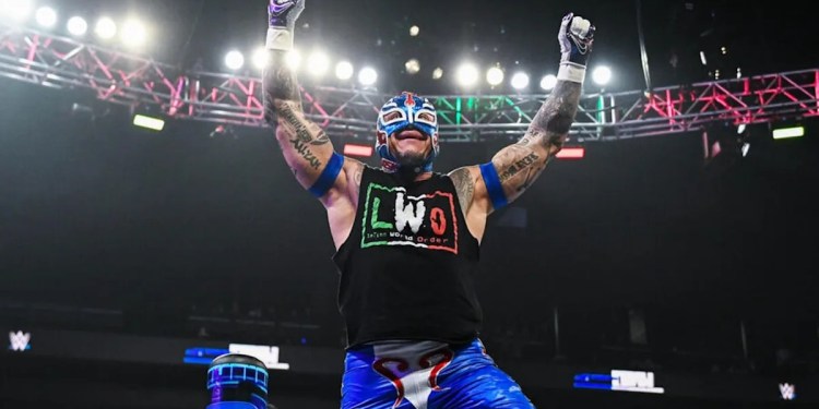 Rey Mysterio Injured During WWE Raw Match with Austin Theory Rey Mysterio Injured During WWE Raw Match with Austin Theory