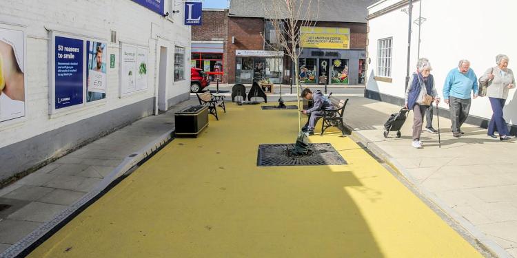 Residents slam bright yellow ‘custard corner’ painted in historic market town Residents slam bright yellow ‘custard corner’ painted in historic market town