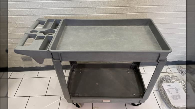 A Franklin Utility Cart in front of a white brick wall