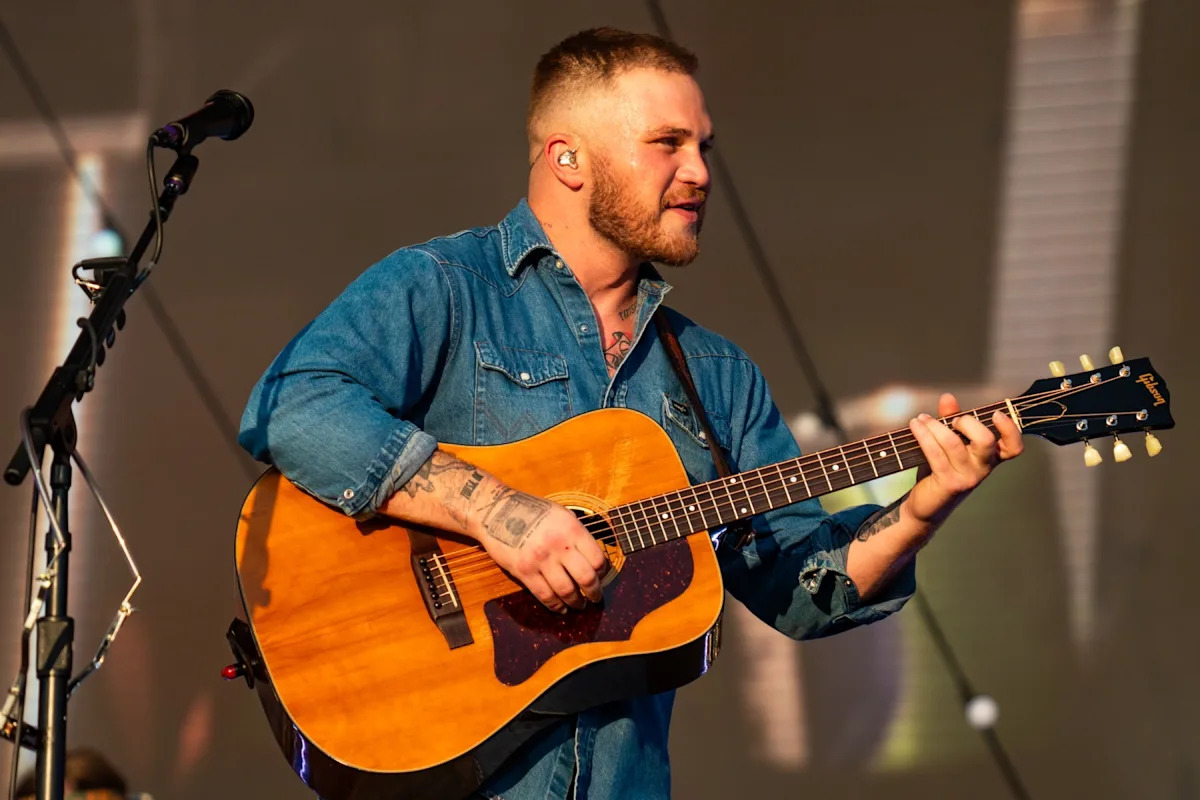 Zach Bryan Scales Fence to Confront Gavin Adcock at Oklahoma Festival Zach Bryan Scales Fence to Confront Gavin Adcock at Oklahoma Festival