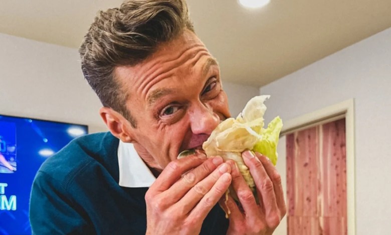 Ryan Seacrest fills his face in a catering truck Ryan Seacrest fills his face in a catering truck