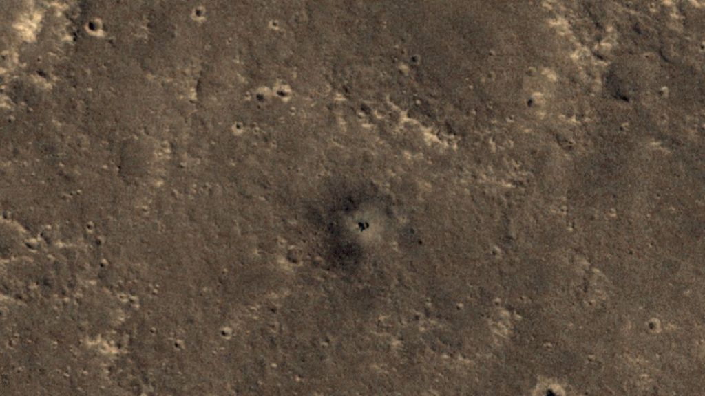 NASA Mars probe spies dusty, retired Insight lander from orbit (photo) NASA Mars probe spies dusty, retired Insight lander from orbit (photo)