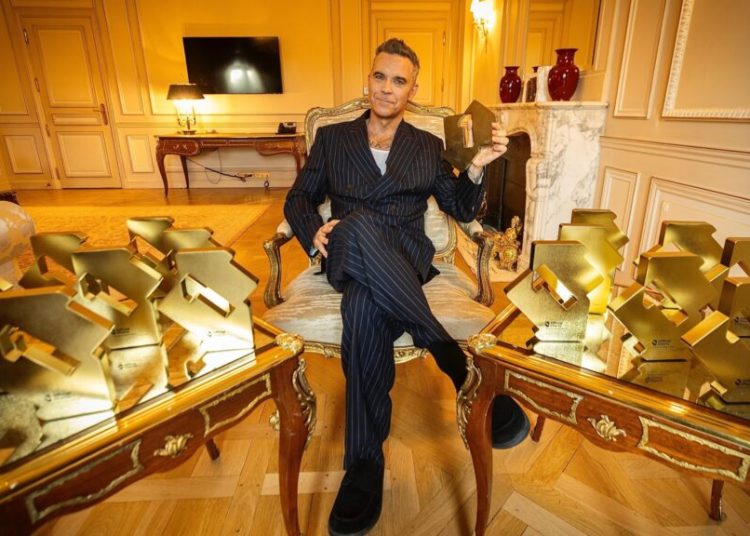 Robbie Williams depășește Beatles în topul albumelor britanice! Robbie Williams depășește Beatles în topul albumelor britanice!