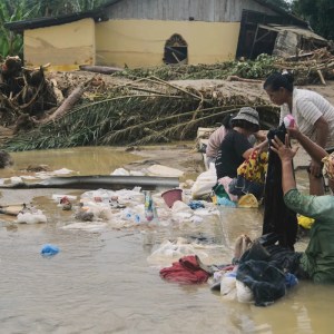 Desperate Search for Survival: Sumatra Residents Rally Together for Food and Water After Devastating Floods Desperate Search for Survival: Sumatra Residents Rally Together for Food and Water After Devastating Floods