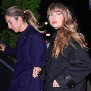Taylor Swift Turns Heads in ,400 Louis Vuitton Coat and ,370 Leather Boots During Dinner with Este Haim Taylor Swift Turns Heads in ,400 Louis Vuitton Coat and ,370 Leather Boots During Dinner with Este Haim