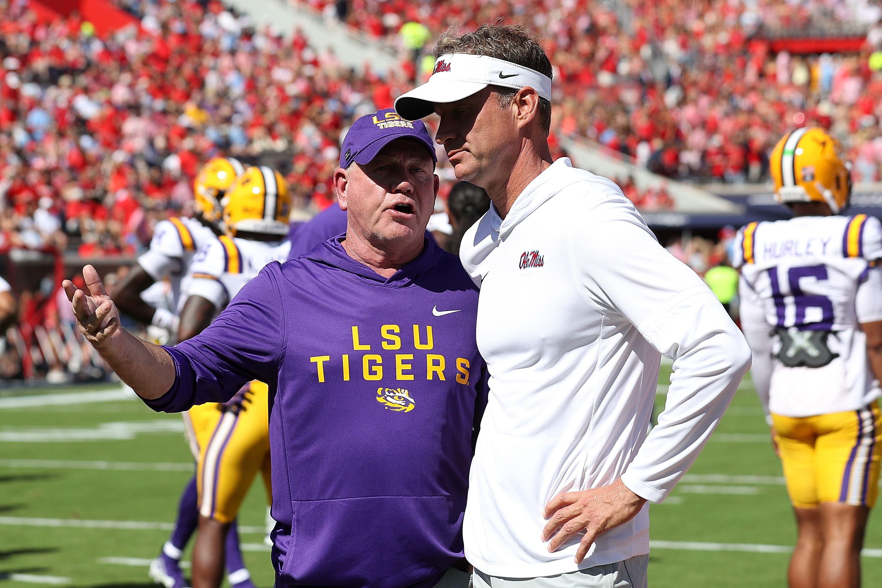 OXFORD, MISSISSIPPI - SEPTEMBER 27: Head coach Brian Kelly of the LSU Tigers and Head coach Lane Kiffin of the Mississippi Rebels before the game at Vaught-Hemingway Stadium on September 27, 2025 in Oxford, Mississippi. (Photo by Justin Ford/Getty Images)