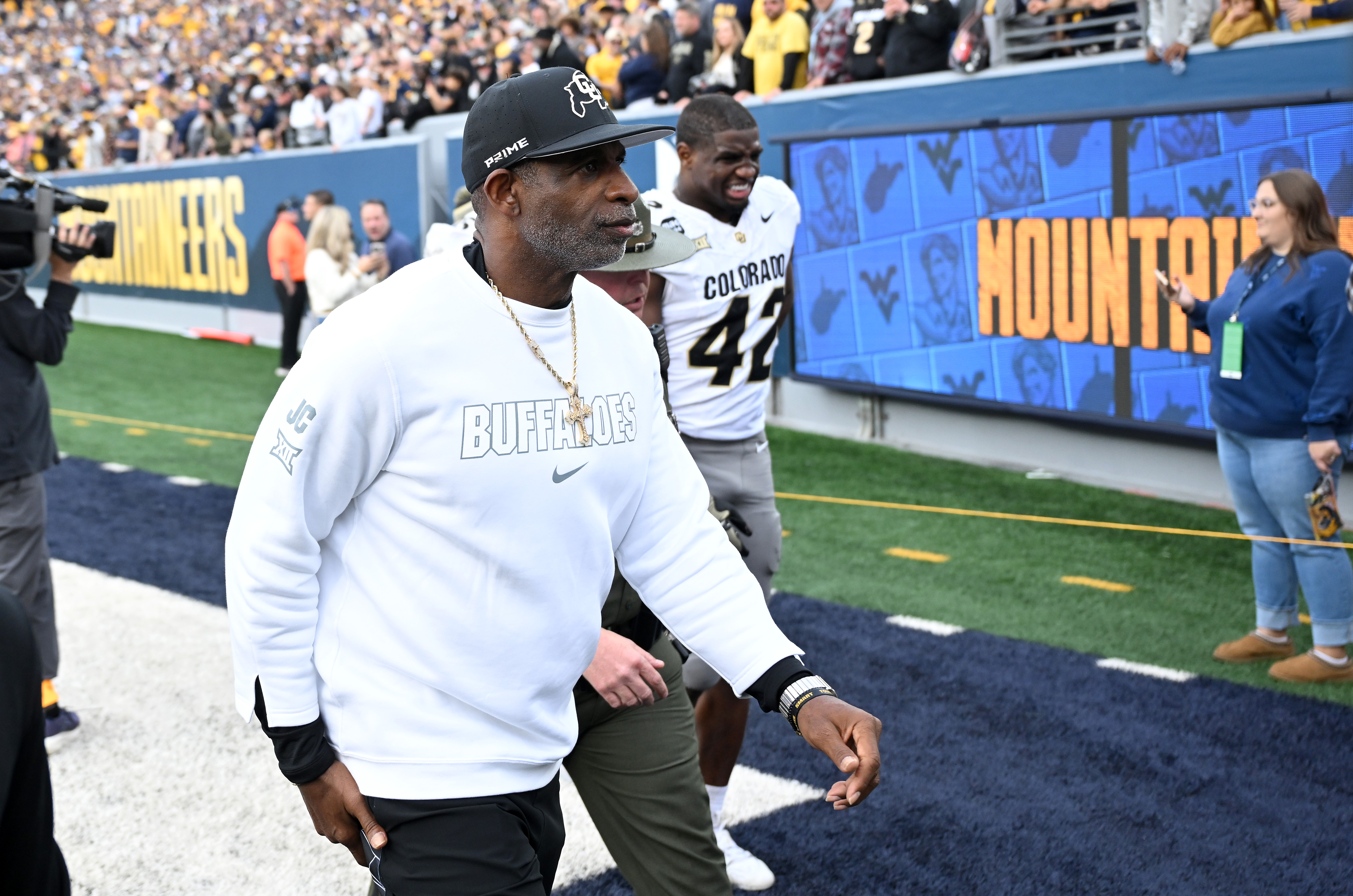 MORGANTOWN, WEST VIRGINIA - NOVEMBER 08: Head coach Deion Sanders of the Colorado Buffaloes walks off the field after a 29-22 defeat against the West Virginia Mountaineers at Milan Puskar Stadium on November 08, 2025 in Morgantown, West Virginia. (Photo by Greg Fiume/Getty Images)