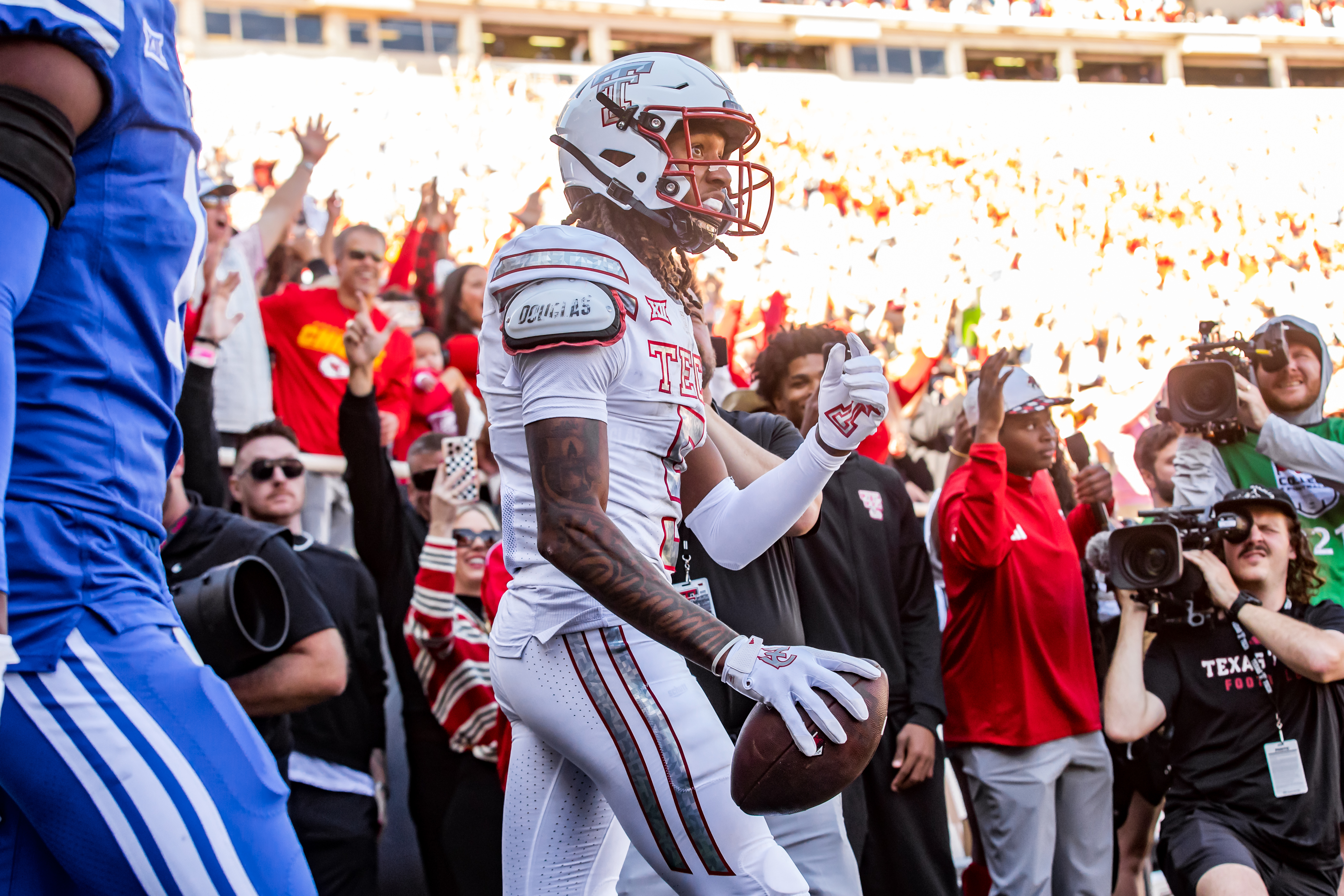 LUBBOCK, TEXAS - NOVEMBER 08: Caleb Douglas #5 of the Texas Tech Red Raiders stands in the end zone after catching a pass for a touchdown during the first half of the game against the BYU Cougars at Jones AT&T Stadium on November 08, 2025 in Lubbock, Texas. (Photo by John E. Moore III/Getty Images)