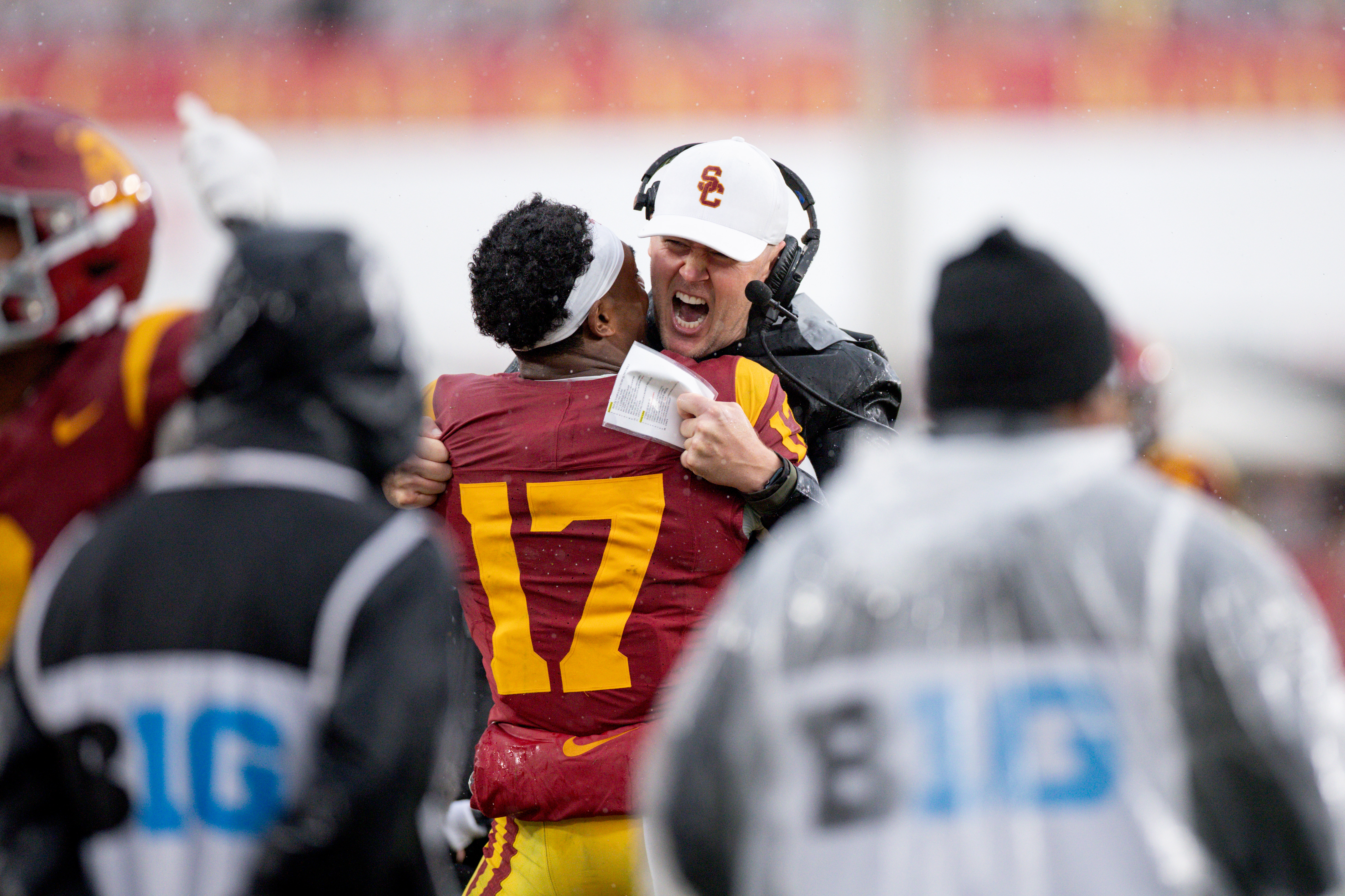 Los Angeles, CA - November 15: USC Trojans head coach Lincoln Riley celebrates with wide receiver Prince Strachan (17) during the second half of an NCAA football game against the Iowa Hawkeyes at the Los Angeles Memorial Coliseum on Saturday, Nov. 15, 2025 in Los Angeles, CA. (Eric Thayer / Los Angeles Times via Getty Images)
